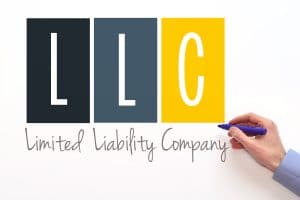 LLC. Limited liability company sign on white background